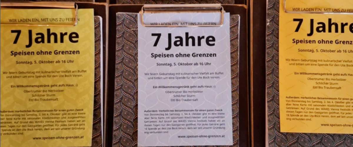 Karten mit Clip; auf den Karten steht "7 Jahre Speisen ohne Grenzen"