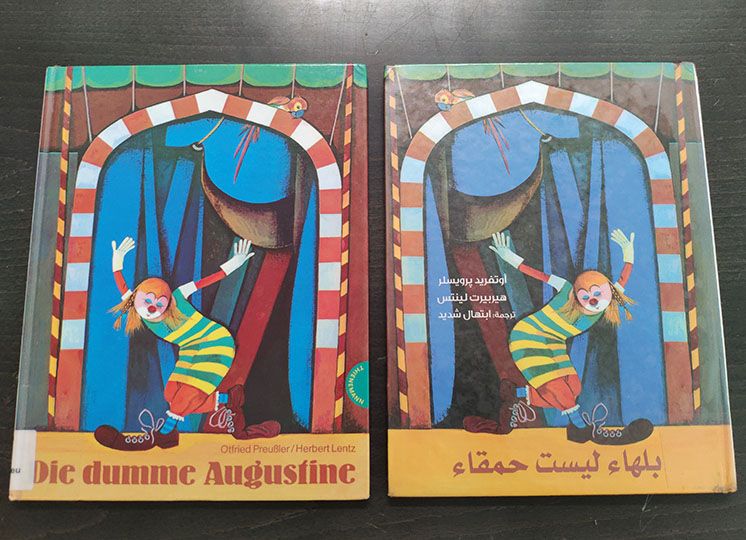 Kinderbuch Die dumme Augustine auf Deutsch und Arabisch